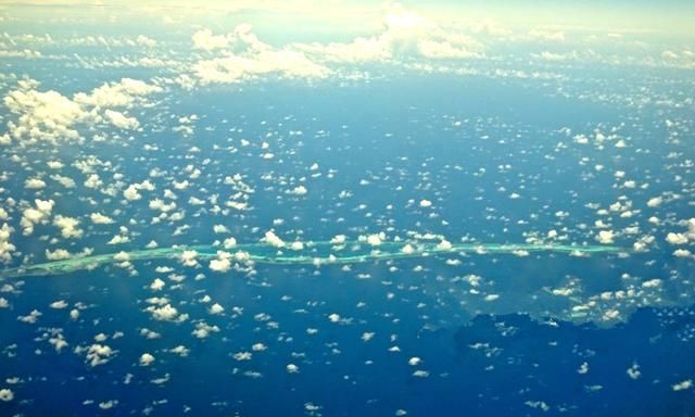 南沙至今仍有众多无人岛礁，能不能填个上百平方公里的大岛试试图9